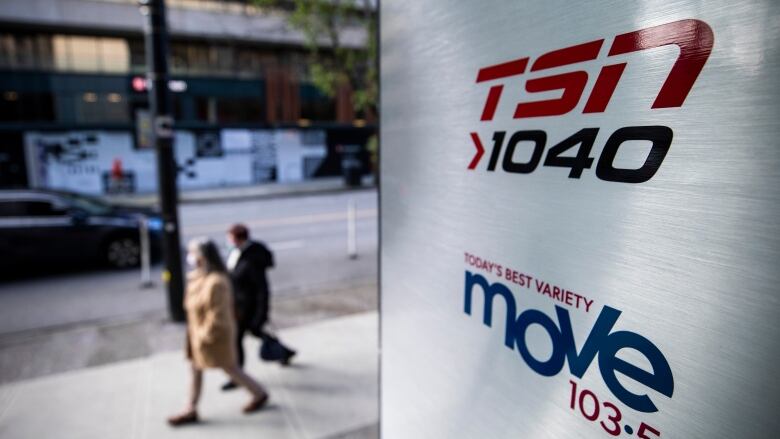 A sign showing Montreal's BCE-owned radio station, 1040 am, is shown.