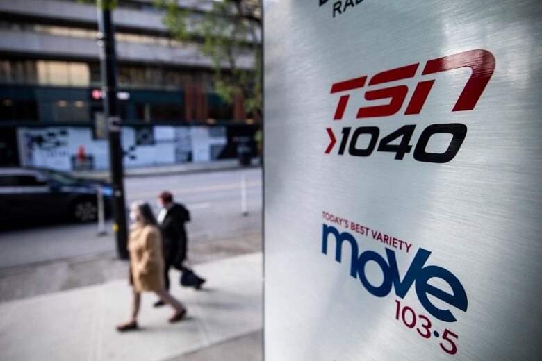 A sign showing Montreal's BCE-owned radio station, 1040 am, is shown.