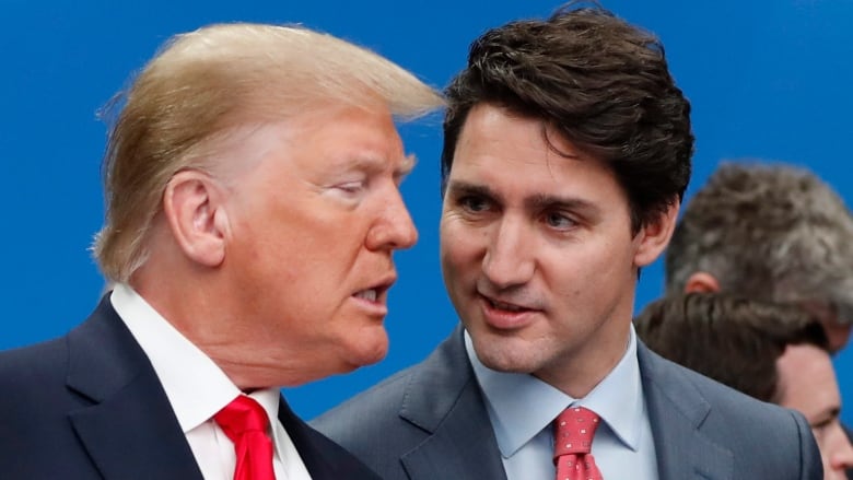 U.S. President Donald Trump, left, and Canadian Prime Minister Justin Trudeau talk prior to a NATO round table meeting at The Grove hotel and resort in Watford, Hertfordshire, England, Wednesday, Dec. 4, 2019. As NATO leaders meet and show that the world's biggest security alliance is adapting to modern threats, NATO Secretary-General Jens Stoltenberg is refusing to concede that the future of the 29-member alliance is under a cloud. 