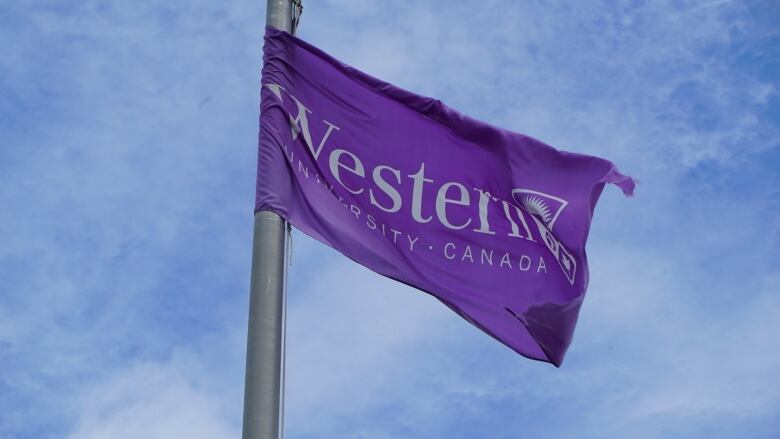 A flag flutters on the breeze at Western University in London, Ont.