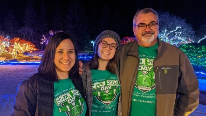 Bernadine Boulet (left), her daughter Mariko and husband Toby wear t-shirts in honor of Green Shirt Day. Humboldt Broncos player Logan Boulet, #27, was declared brain dead at 11:45 a.m. MT on April 7, 2018. His donation of organs and tissues helped six people and spurred a wave of organ donation registrations across Canada, dubbed the #LoganBouletEffect. 