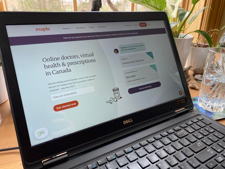 Computer showing web page for Maple, a virtual health platform