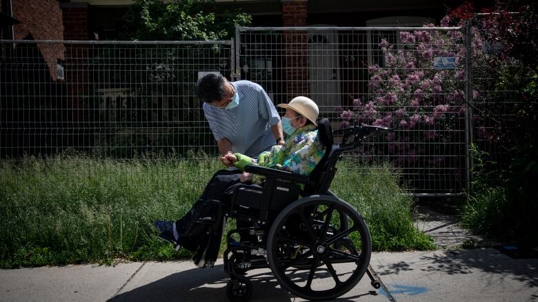 Sharon Korean with his 89-year-old mother at a Long Term Care Home