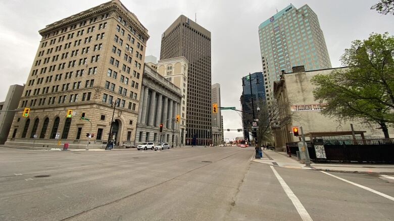 Buildings stand next to an empty intersection.