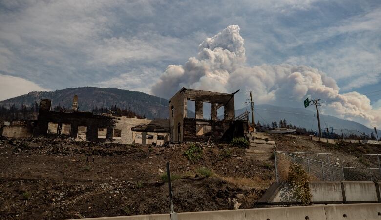 A burned out building on a hill