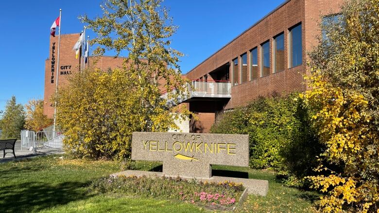 Building with sign that says city of yellowknife.