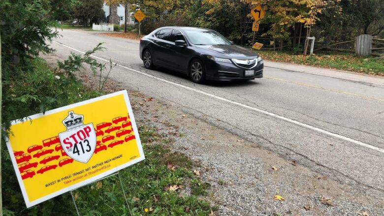 Opponents of the proposed GTA West Highway display a lawn sign in Belfountain, part of the town of Caledon. The proposed 52-kilometre-long Highway 413 would connect Vaughan to Milton by cutting through Caledon.   