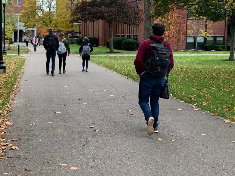 Students walking on the UPEI campus.