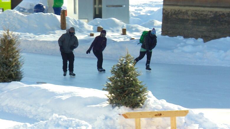 Skaters try out the trail on Nestaweya River Trail in Winnipeg.