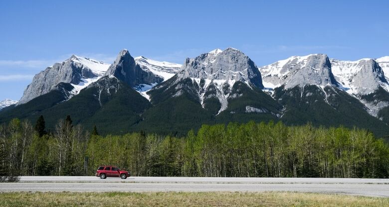 Traffic on the Trans Canada highway passing through Canmore, Alta., in a file photo from 2021.