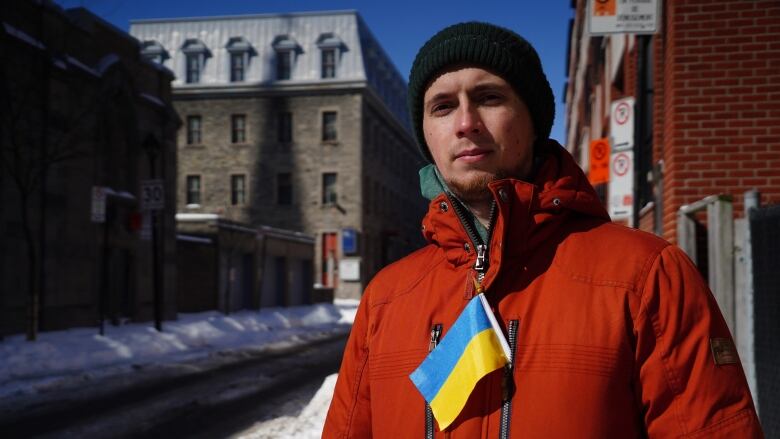 Man in red coat with Ukraine flag