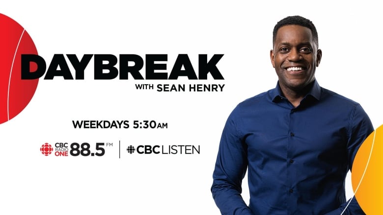 Image of CBC Daybreak host Sean Henry in a blue shirt with text saying name of show and frequency.