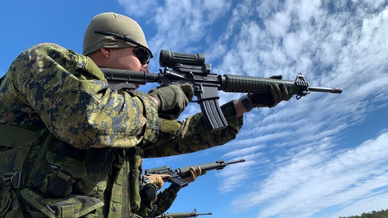 Soldiers with the 5e Rgiment d'artillerie lgre from Valcartier, Que., participate in weapons training on Monday April 11 at Adazi base in Latvia.