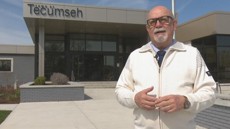 Tecumseh mayor Cary McNamara stands in front Tecumseh town hall.