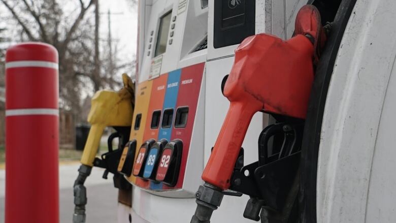 Self-serve pumps at a gas station.