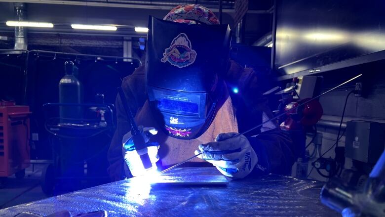 Schembri works on a welding project.