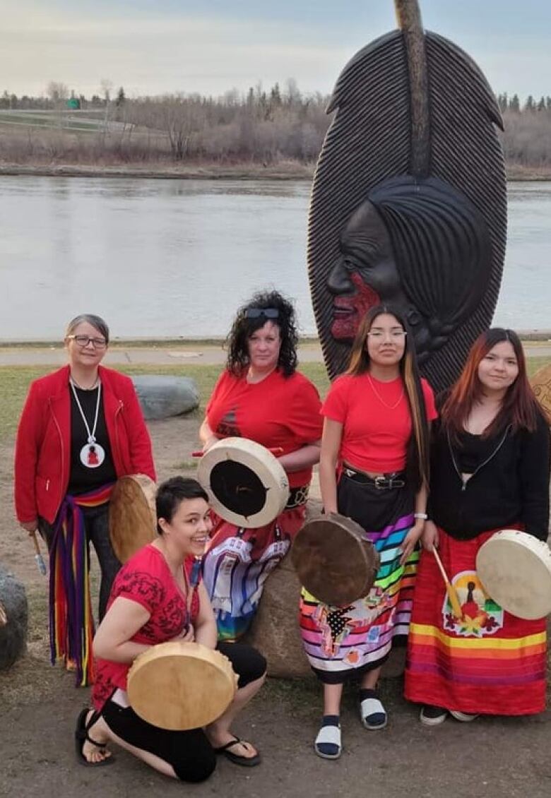 Members of the Spirit Strong Singers pose for a photo at an event.