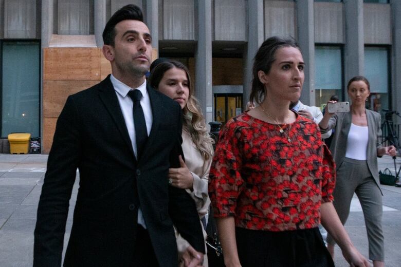 Jacob Hoggard leaves court after being found guilty of one count of sexual assault, in Toronto, Sunday, June 5, 2022.