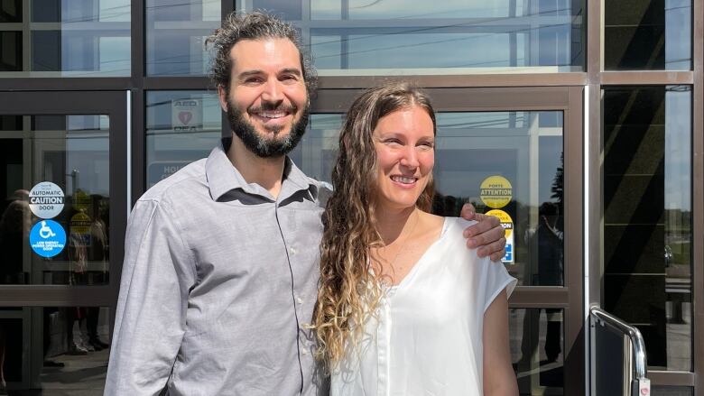 Nicholas DeAngelis and Britney Green standing outside the Moncton courthouse.