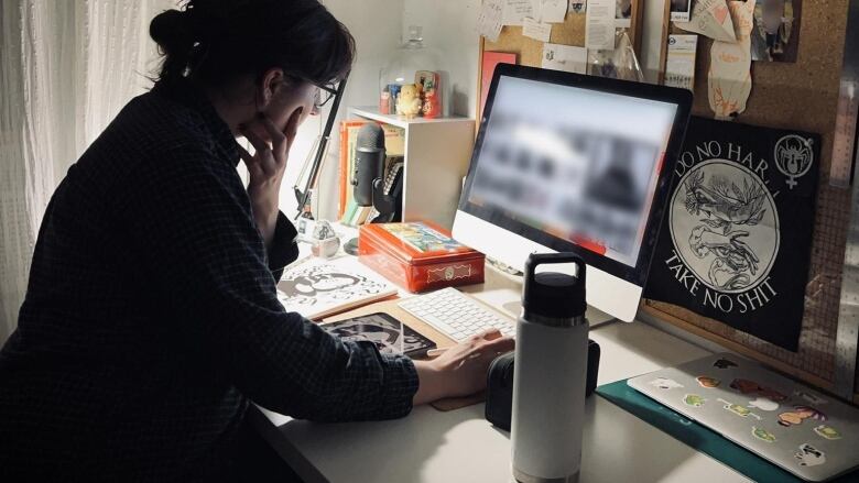 Audrey Meubus is seen working another late night in her home office.