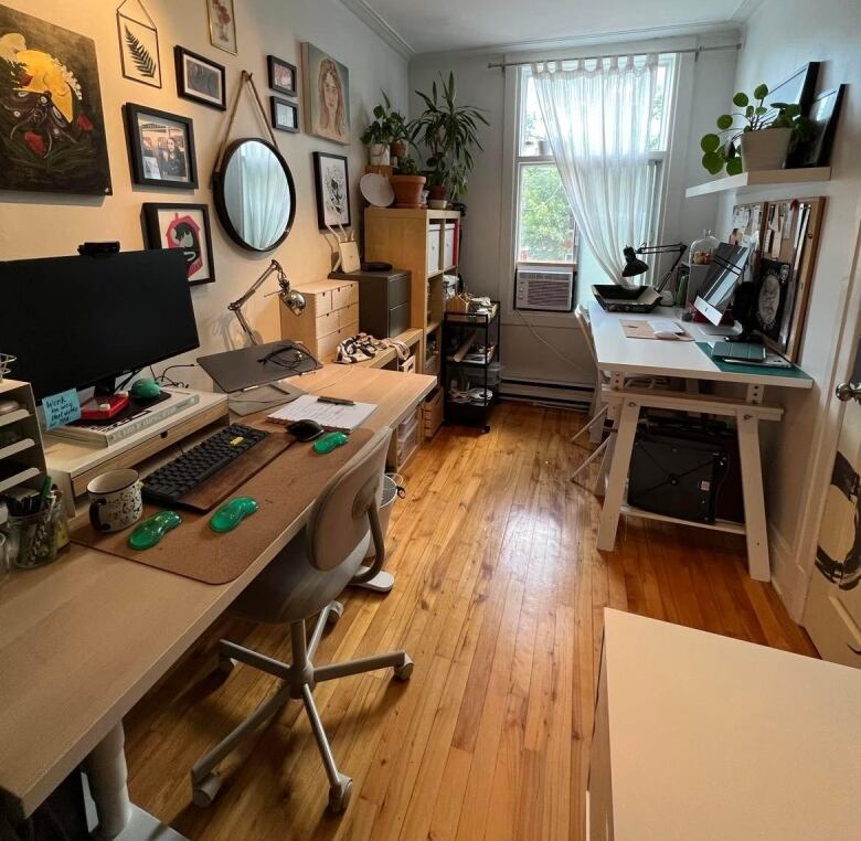 Audrey's home office, with one desk for her corporate job and another for her art projects.