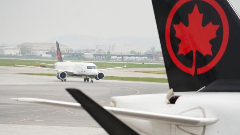 An Air Canada flight taxis on the tarmac at Pierre Elliott Trudeau International Airport in Montreal, Quebec.