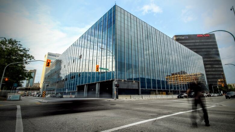 A wide shot of a glass-fronted building in Winnipeg's downtown.