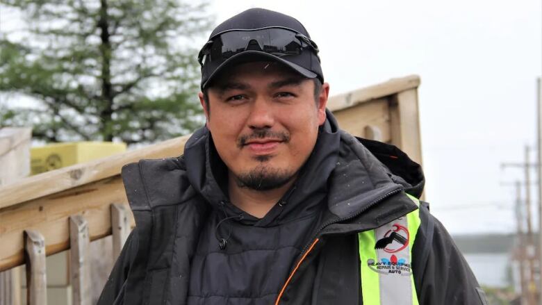 A young Indigenous man in a toque.