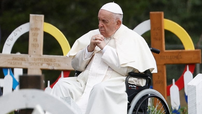 A man sits in a wheelchair.