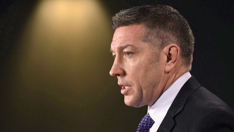 Former NHL player and child advocate Sheldon Kennedy speaks during a press conference on Parliament Hill in Ottawa, on Monday, Feb. 5, 2018. A group of Canadian sport leaders have lent their voice to the growing chorus calling for an independent body to handle cases of harassment and abuse. 