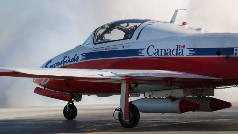 A Snowbird sits on a tarmac.