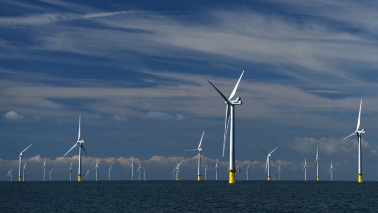 Giant turbines are seen off the coast of Sussex on Sept. 20, 2017, in Brighton, England.