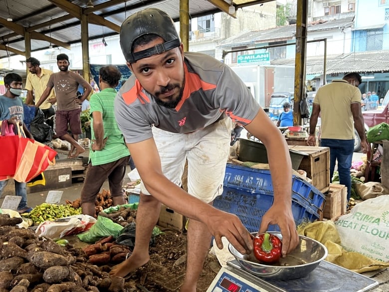 A vegetable seller in Sri Lanka.