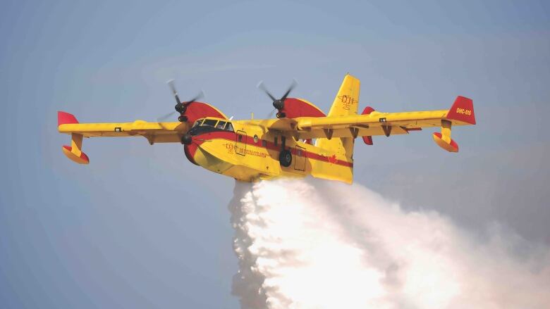 A yellow water-bomber.