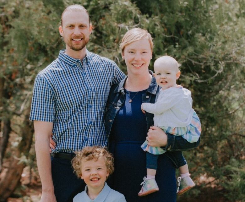 Kendal Carlberg is joined by her family, including her husband Nathan, their son Lucas and daughter Maggie, in this portrait. 