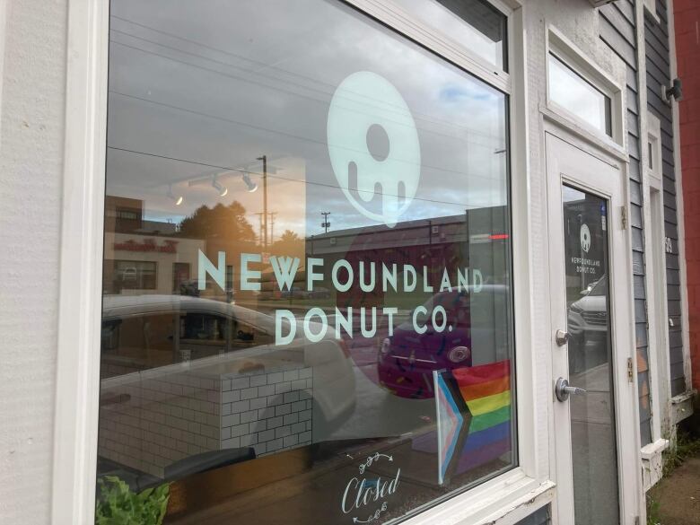 The Newfoundland Donut Company's logo, on it's front window, on Harvey Road in St. John's. 