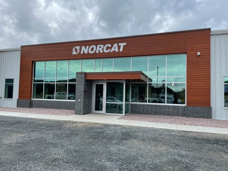 A commercial building with the word NORCAT on it.