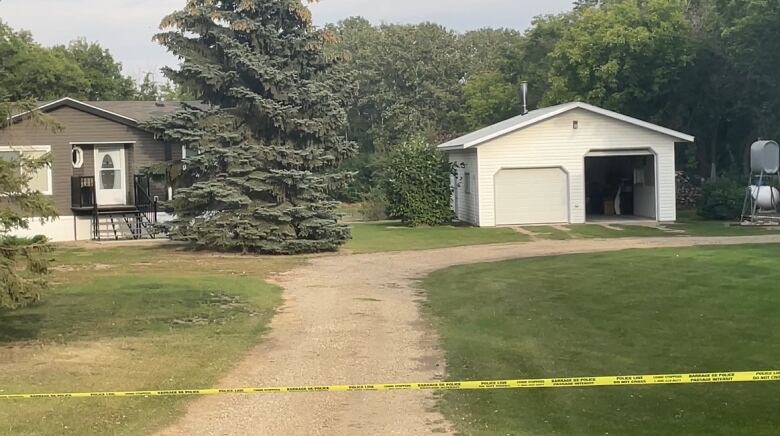 Rural property with police tape.