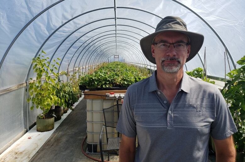 Dean Kreutzer, owner of Over the Hill Orchards and Winery near Lumsden, says he treats his business like a laboratory, and hasn't been afraid to stumble when experimenting.