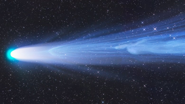 The long and narrow photograph shows a stunning and bright comet with a long tail, which is a hallmark of comets in our solar system.