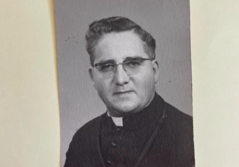 A close-up picture of a priest wearing his garments.