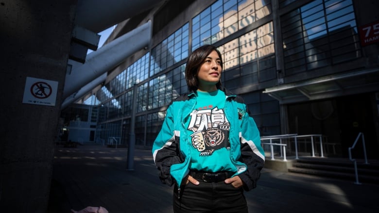 Kat Jayme, writer and director of The Grizzlie Truth is pictured in Vancouver, British Columbia on Wednesday, September 21, 2022. She is wearing a Vancouver Grizzlies top.