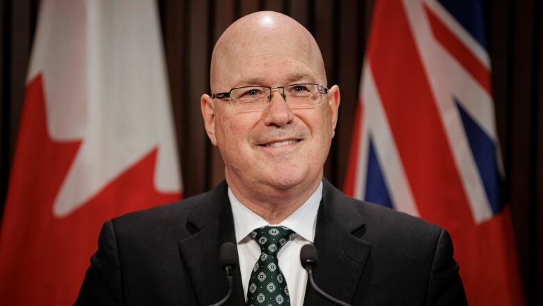 Minister of Municipal Affairs and Housing, Steve Clark, takes questions from members of the media after tabling new affordable home legislation, at Queens Park, in Toronto, on March 30, 2022.