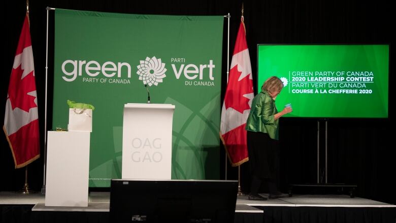 Elizabeth May, leaves the stage after speaking ahead of the party's leadership announcement in Ottawa, Saturday October 3, 2020. 