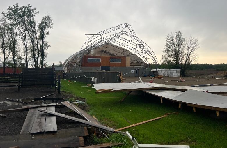 The main riding arena at the Brookson Farm was severely damaged in the May 21, 2022, derecho storm in Ottawa.