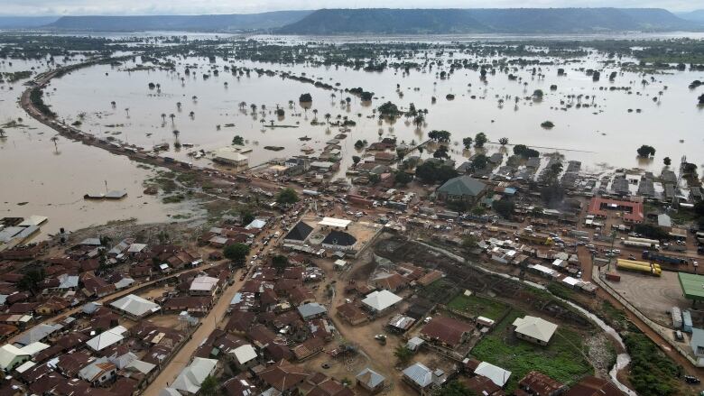 Flooded streets and houses.