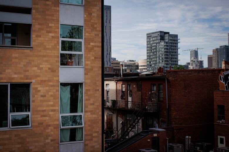 A juxtaposition of old and new apartment buildings in Torontos Kensington Market are pictured on Jun. 13, 2022.