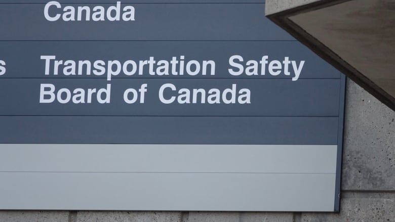 A sign reading 'Transportation Safety Board of Canada'.