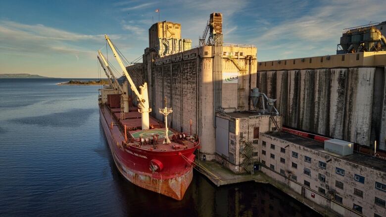 A cargo ship at a port.