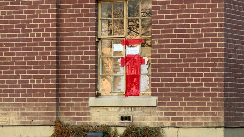 A boarded-up window